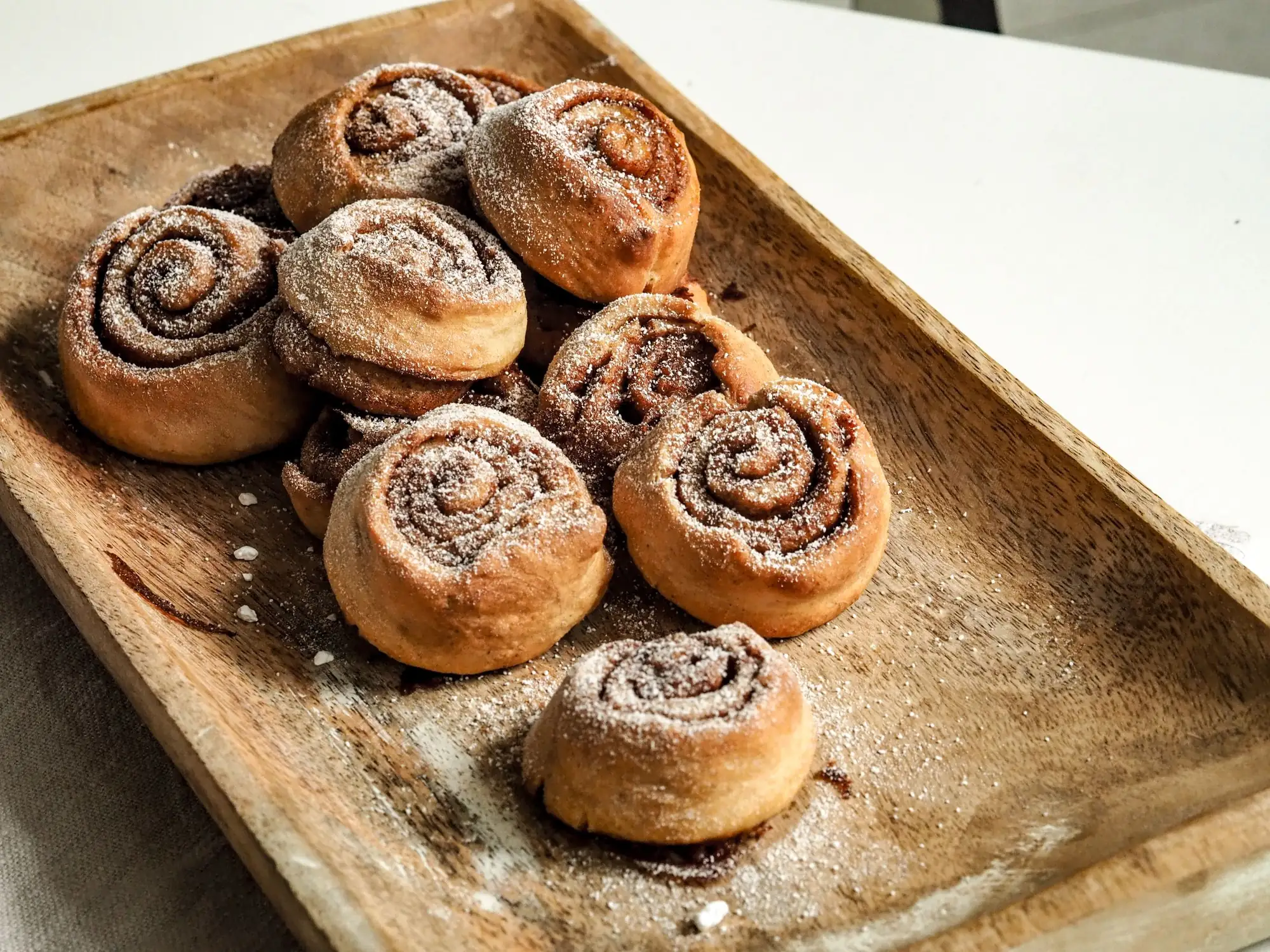 A tray of cinnamon buns fresh from the oven